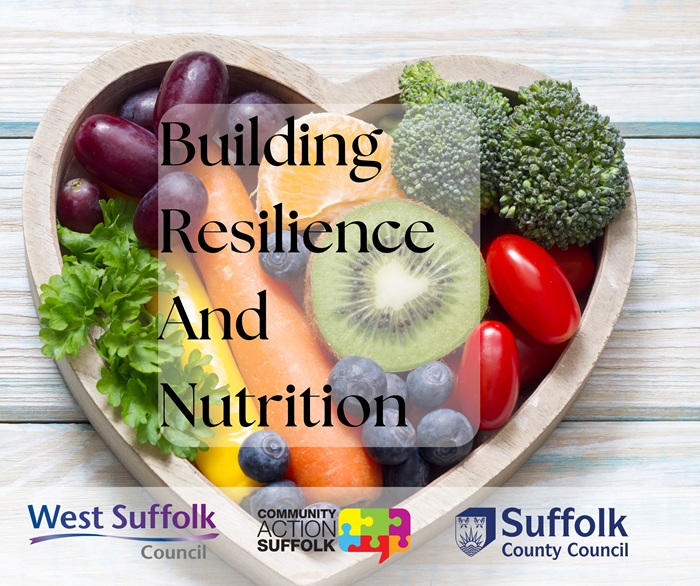 The image shows healthy food in a heart shaped bowl. The text reads Building Resilience and Nutrition. West Suffolk Council's logo features alongside Community Action Suffolk and Suffolk County Council logos