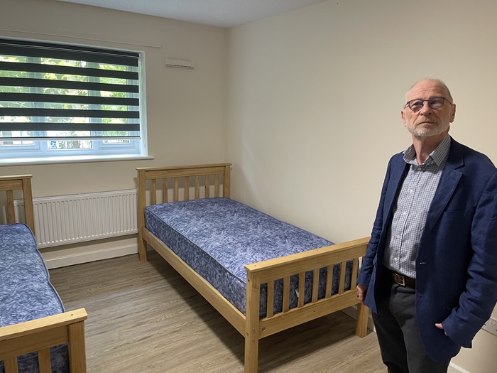 Cllr Richard O'Driscoll in a bedroom at the Mildenhall property