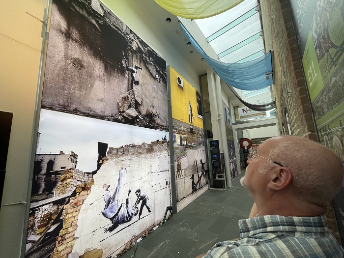 Banksy's Ukraine pieces viewed by Cllr Ian Shipp at the National Horseracing Museum in Newmarket