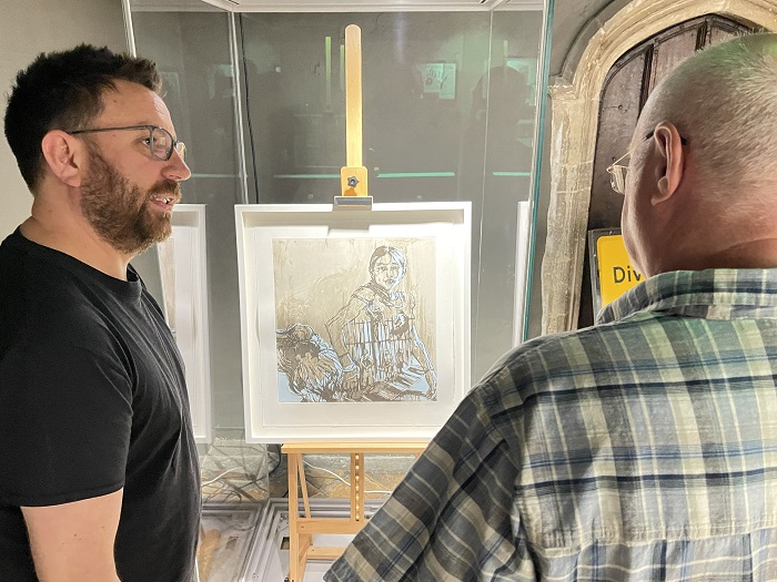 Dan Clarke and Cllr Ian Shipp view Argentina by Swoon at Moyse's Hall Museum