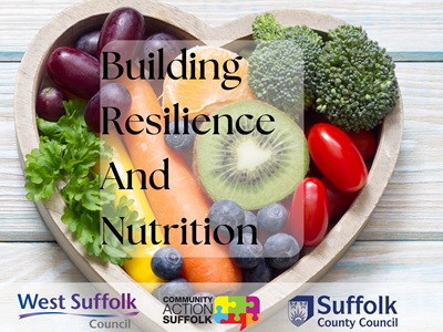 Building Resilience and Nutrition. The image shows a heart shaped bowl containing healthy food including fruit. The text reads Building Resilience and Nutrition. The council logo features alongside Community Action Suffolk and Suffolk County Council logos icon